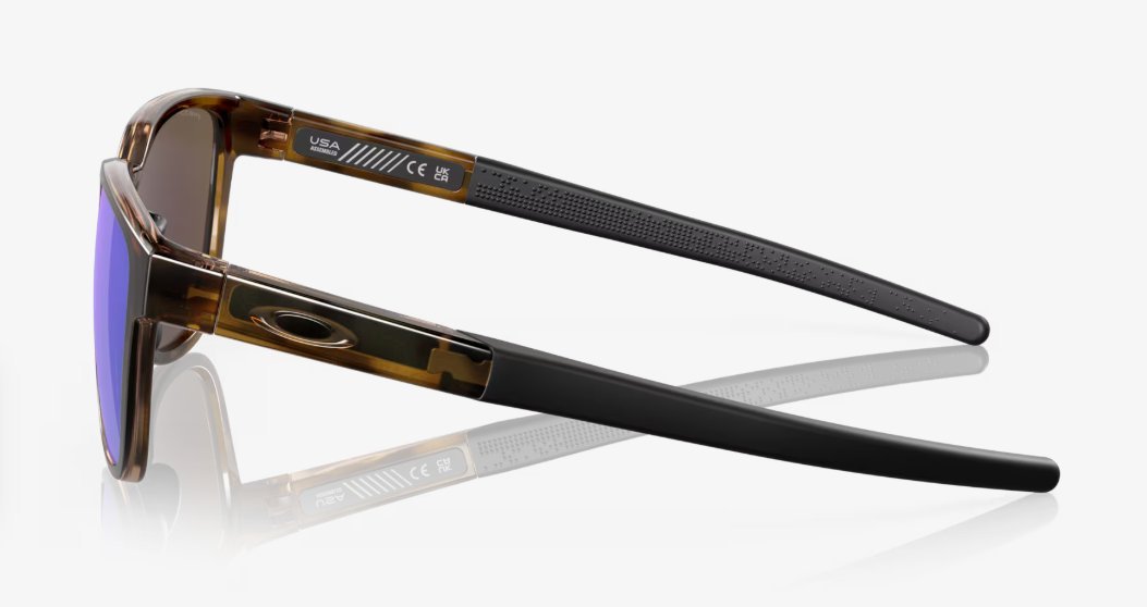 Óculos Solar Esportivo OAKLEY OO9250 (ACTUATOR) 57-16 04 (Acetato Marrom Translúcido/Prizm Polarizado Azul Espelhado)